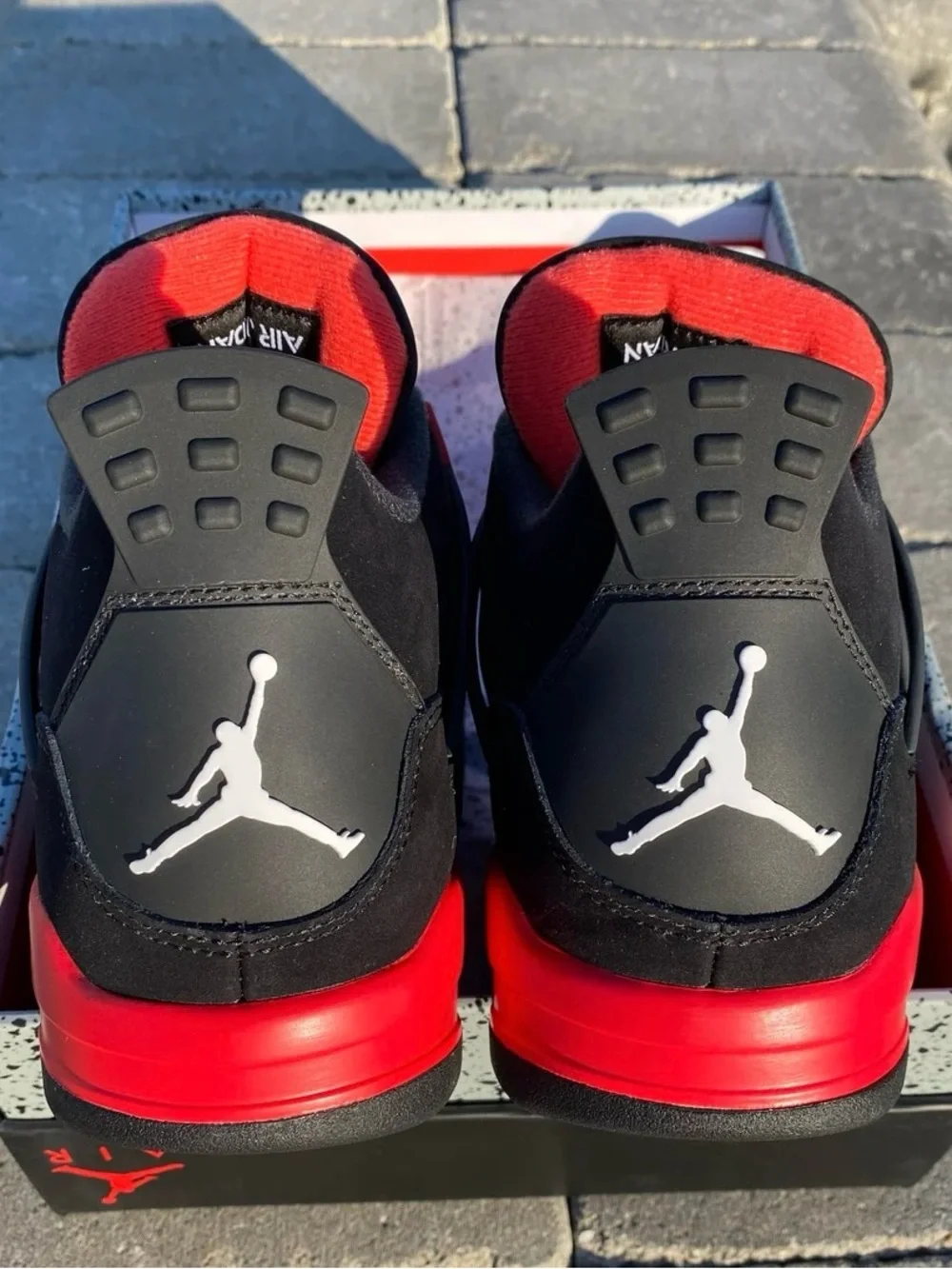 Jordan Men’s Black and Red Retro Sneakers